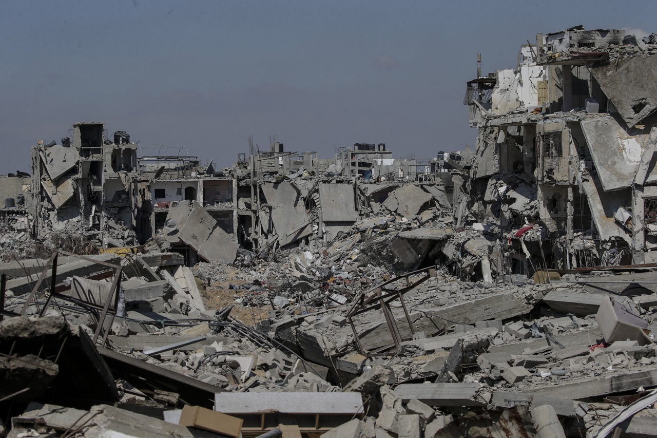巴勒斯坦民众9日重返加萨走廊南部城市汗尤尼斯，发现许多房屋已全毁。欧新社
