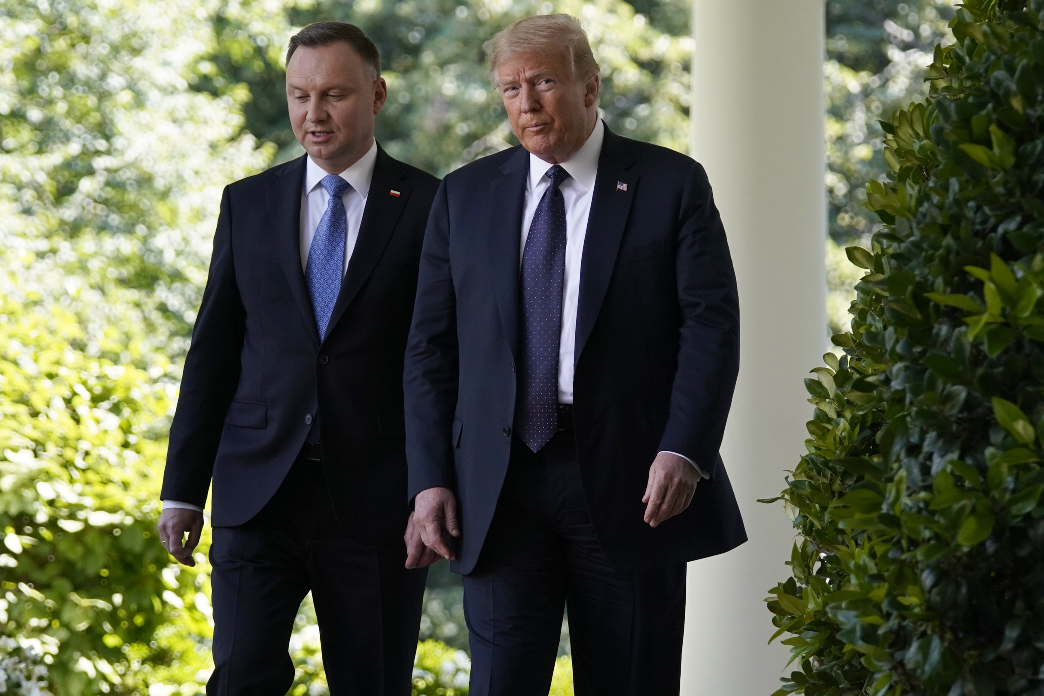 波兰总统杜达（左）2020年6月访问白宫，会晤时任美国总统川普（右）。美联社
