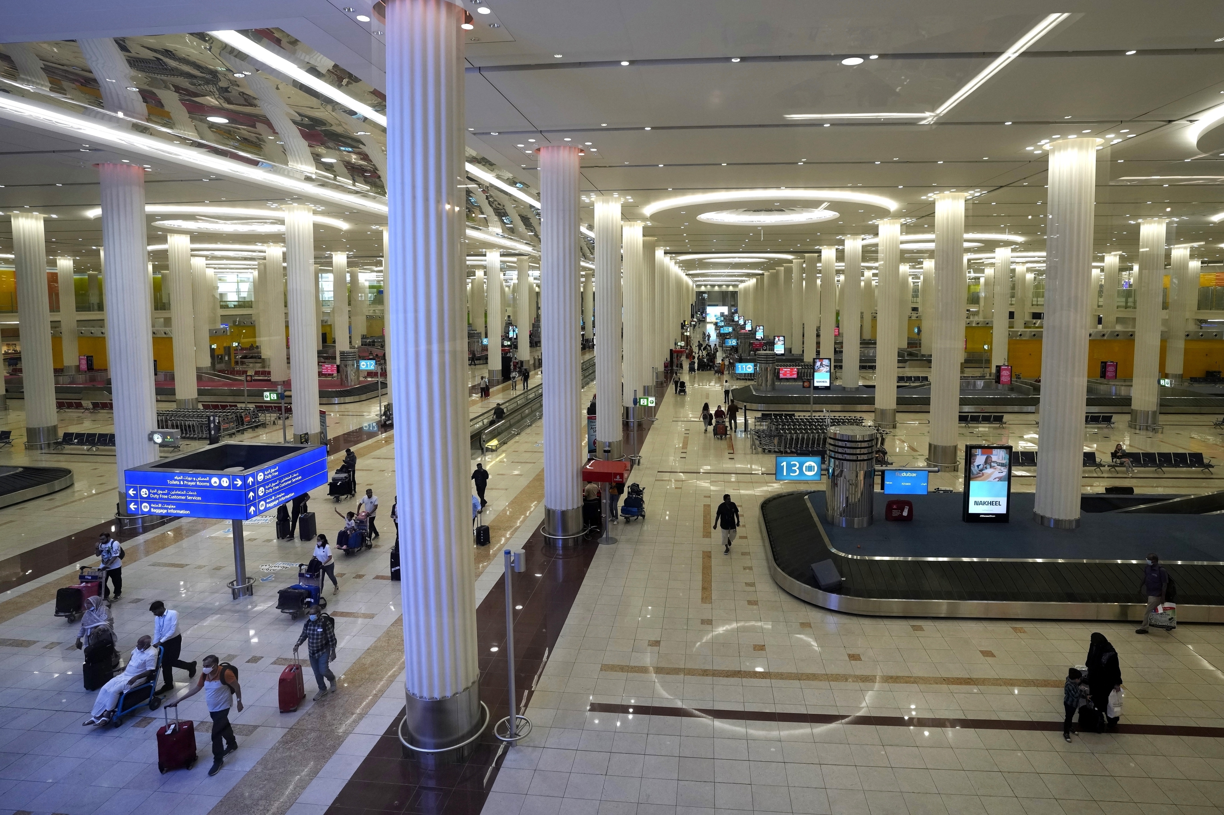 杜拜机场因大雨淹水，阿联酋航空在官网宣布，今天上午9时前将不接受从杜拜转机的转机客，仅接受目的地为杜拜的旅客，导致不少旅客在桃园机场改航班或退票。图为杜拜机场。美联社