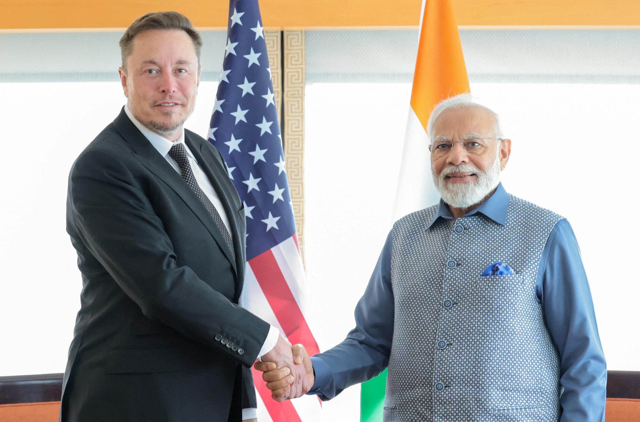 特斯拉执行长马斯克（左）去年6月与前往美国访问的印度总理莫迪，在纽约会面。  路透