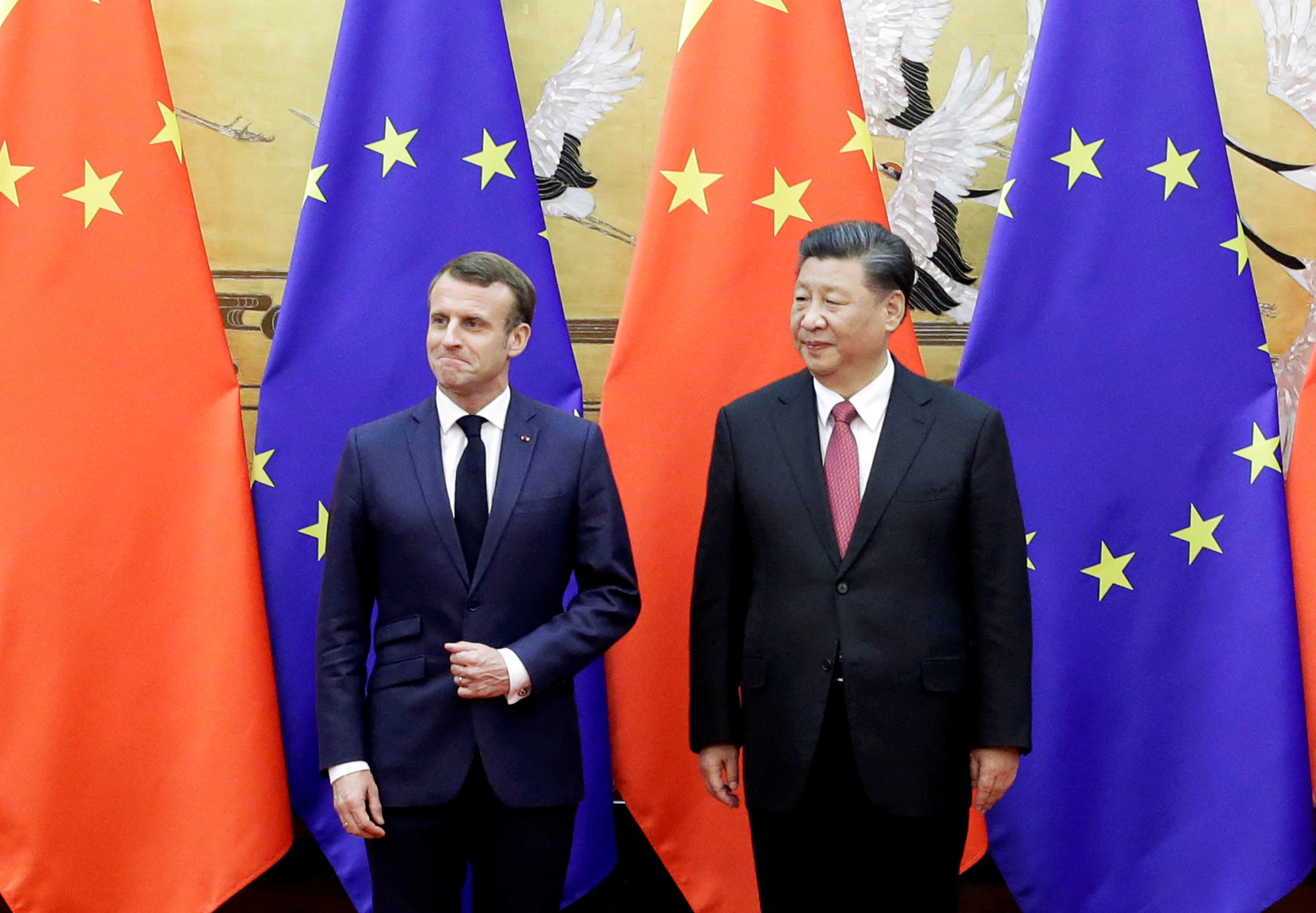 中国国家主席习近平（右）5日前往法国展开国是访问。图为法国总统马克宏（左）于2019年出访中国。(路透)