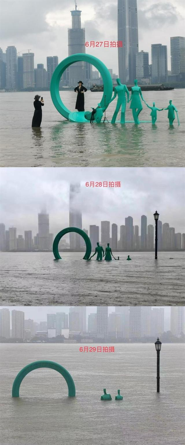 武汉关水位两天上涨超1.6米，汉口江滩「一家五口」雕塑已被淹没大半。（取材自齐鲁壹点）